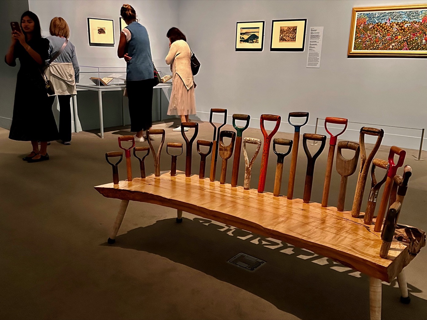 A bench built from antique spade and shovel handles in a gallery at the MFA, Boston.