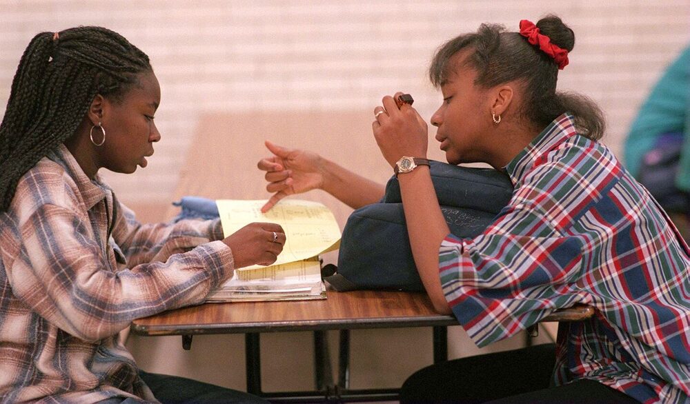 A 1996 peer-tutoring session at Boston Latin School, photographed for the Boston Globe